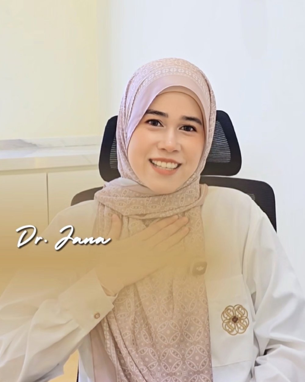 Dr. Sujana binti Ramli at her consultation desk